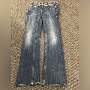 Rock & Roll Cowgirl Size 24x34 riding blue jeans